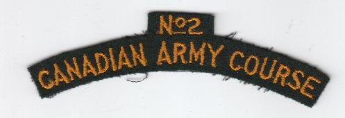 Embroidered No 2 CAUC titles. Top, scarlet embroidery on yellow. University not identified. Bottom title. This pattern, in yellow on dark green has been identified as the generic No 2 course title.